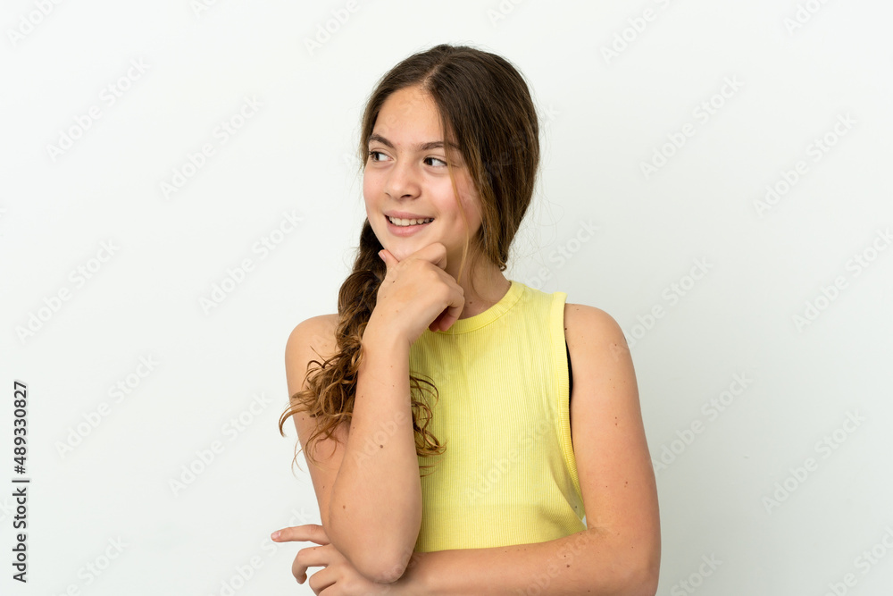 Little caucasian girl isolated on white background looking side Little caucasian girl isolated on white background looking side