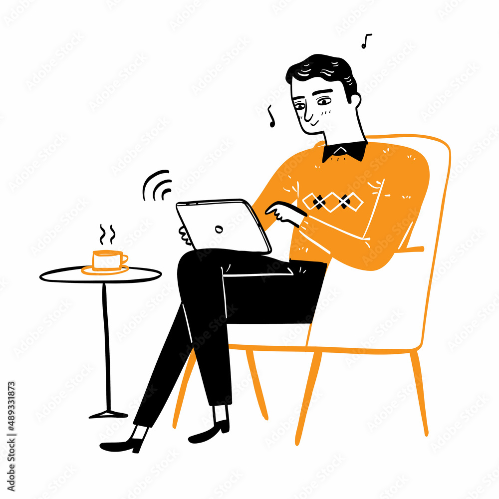 Handsome young man relaxing with music sitting on the sofa using a tablet
