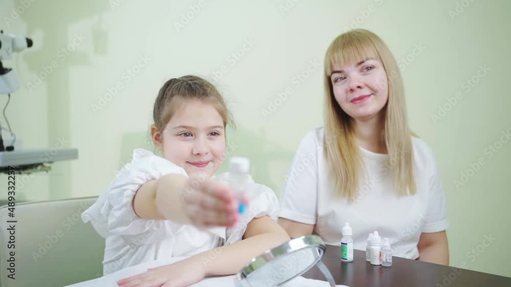 the girl with a case of orthokeratological contact lenses.night lenses. the girl with a case of orthokeratological contact lenses.night lenses.