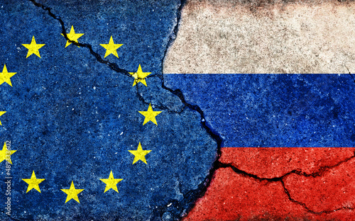EU vs Russia  (War crisis , Political  conflict). Grunge country flag illustration (cracked concrete background)
