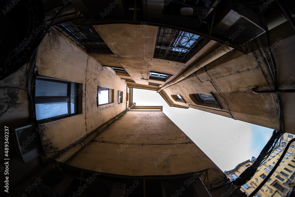 Fototapeta premium Round residential building in the form of a well