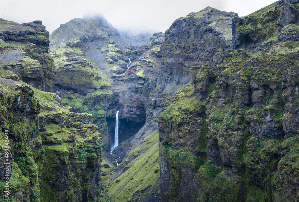 stunning Múlagljúfur canyon in southern iceland, long gorge with a river and waterfall from the vatnajökull glacier