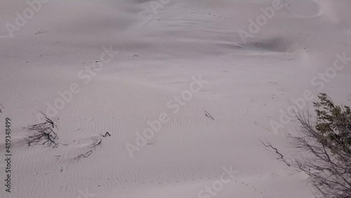 White sand dunes and turquoise sea