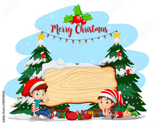 Empty banner in Christmas theme with children in Christmas costumes © blueringmedia