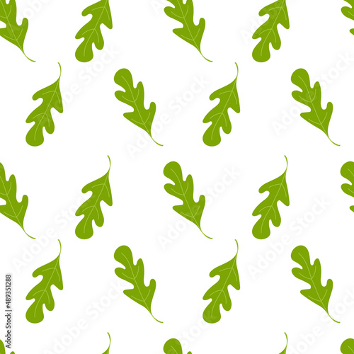 Seamless pattern with arugula leaves. Seamless design with green leaves. Wrapping, scrapbook paper, textile, fabric, wallpaper design. Vector illustration.