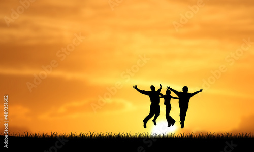 silhouette of a Three person jumping in the sunset. happy Friends and Business Team Concept 