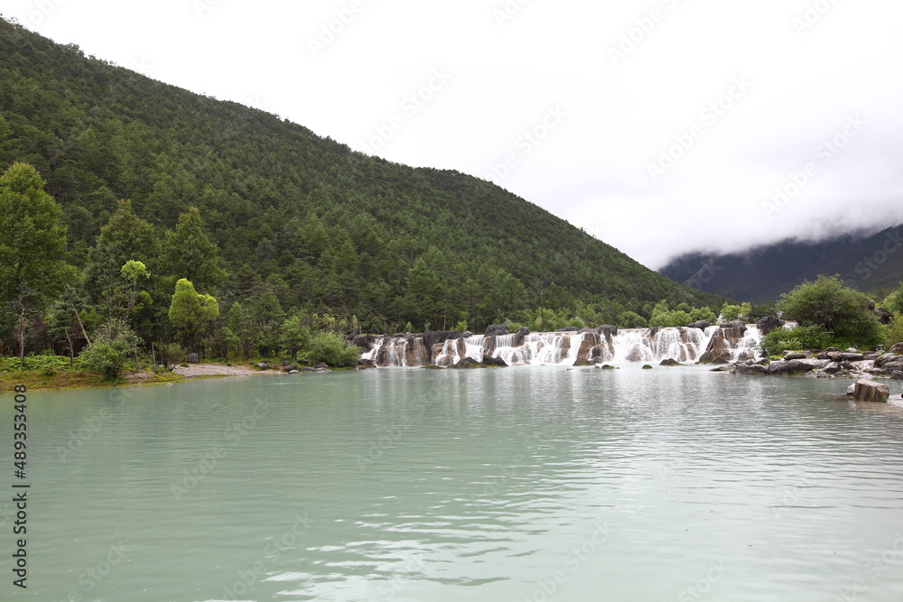 Baishui River in Yulong Naxi Autonomous County, Lijiang City, Yunnan Province, also known as Blue Moon Valley