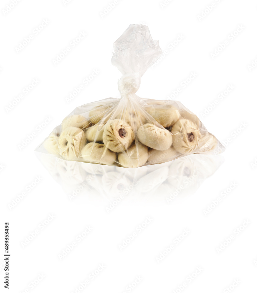Obraz premium Baozi, buuz, manti, large quantity per pack, isolated on white background