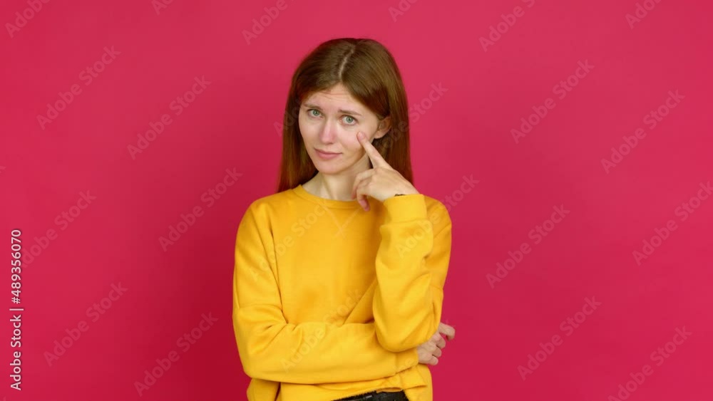 Young woman looking front over isolated background Young woman looking front over isolated background