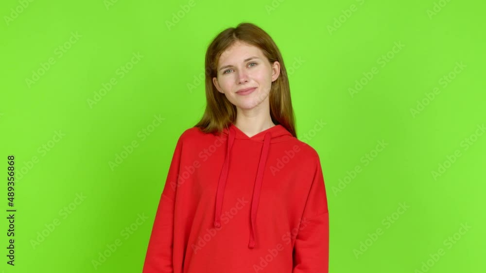 Young woman with happy face over isolated background. Green screen chroma key Young woman with happy face over isolated background. Green screen chroma key