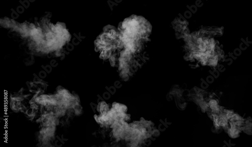 A set of six different types of swirling, writhing smoke, steam isolated on a black background for overlaying on your photos