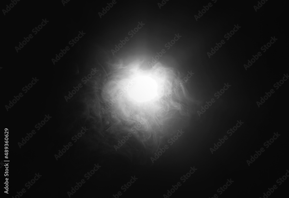 Smoke over black background. Fog or steam texture. Smoke over black background. Fog or steam texture.