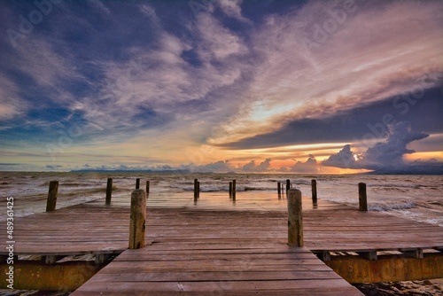 Fototapeta Naklejka Na Ścianę i Meble -  sunset at a pier, beach, coast