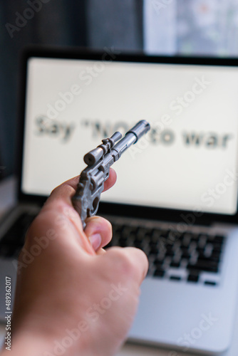 the inscription on the laptop monitor screen "say no to war"