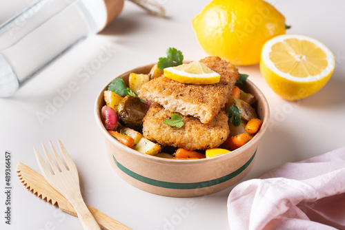 Canvas Print Vegan Plant based fish with crispy batter and roasted vegetables