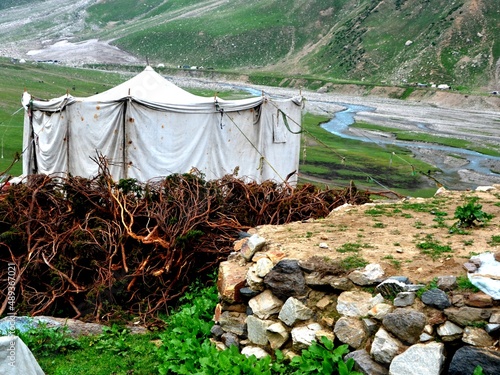 Traditional people camping site in the hilly pastures during summer season   © Asif