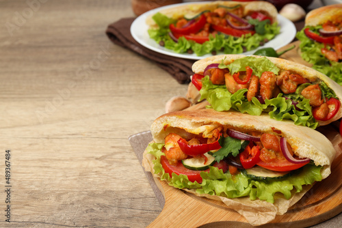 Concept of tasty food with pitas with chicken meat