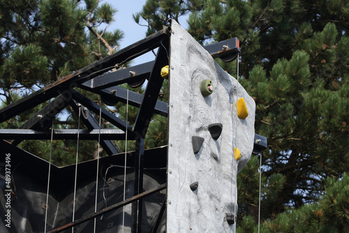 A close-up of a mobile climbing wall. This climbing wall can be set up at almost any place.
