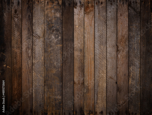 Dark weathered grunge wooden planks texture background
