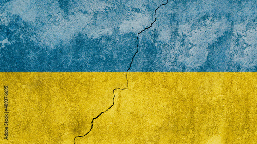 flag of Ukraine painted on wall background.