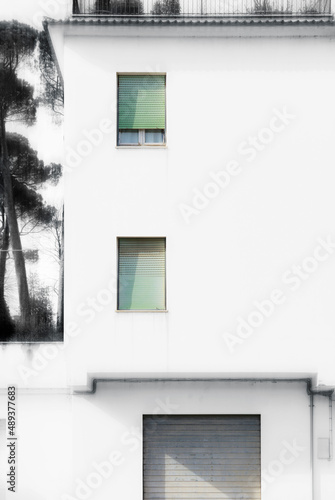 Facade of old white building, front view © Allusioni