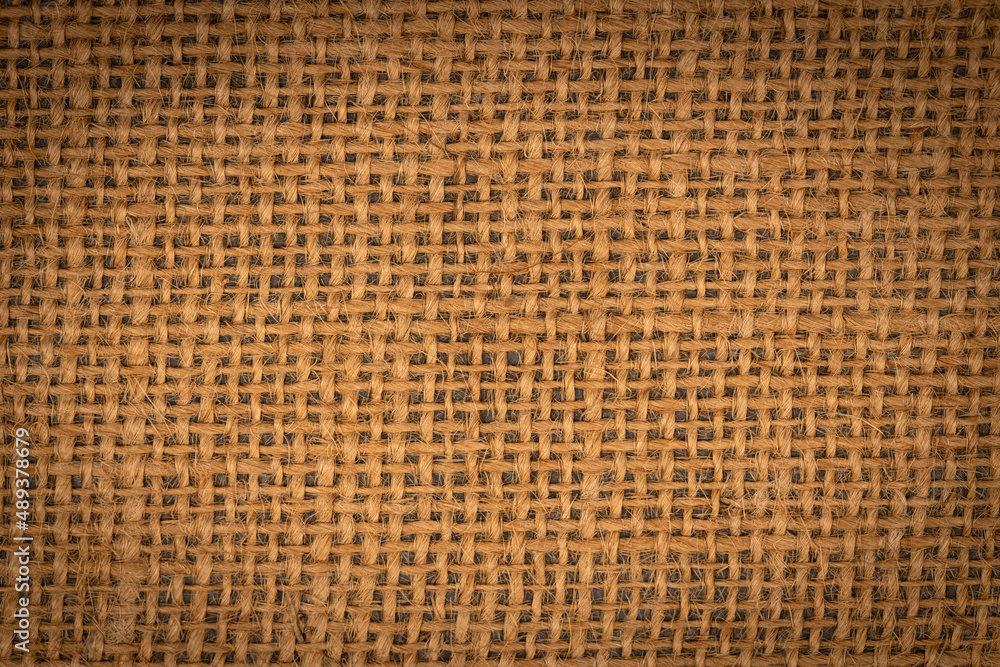 Brown Jute Background, simple Illustration, Texture with vignette effect. Macro Jute lines. Brown Jute Background, simple Illustration, Texture with vignette effect. Macro Jute lines.