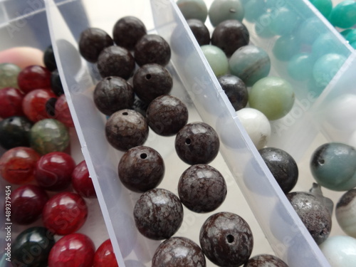 Various Gem Stone Beads in an Organizer photo