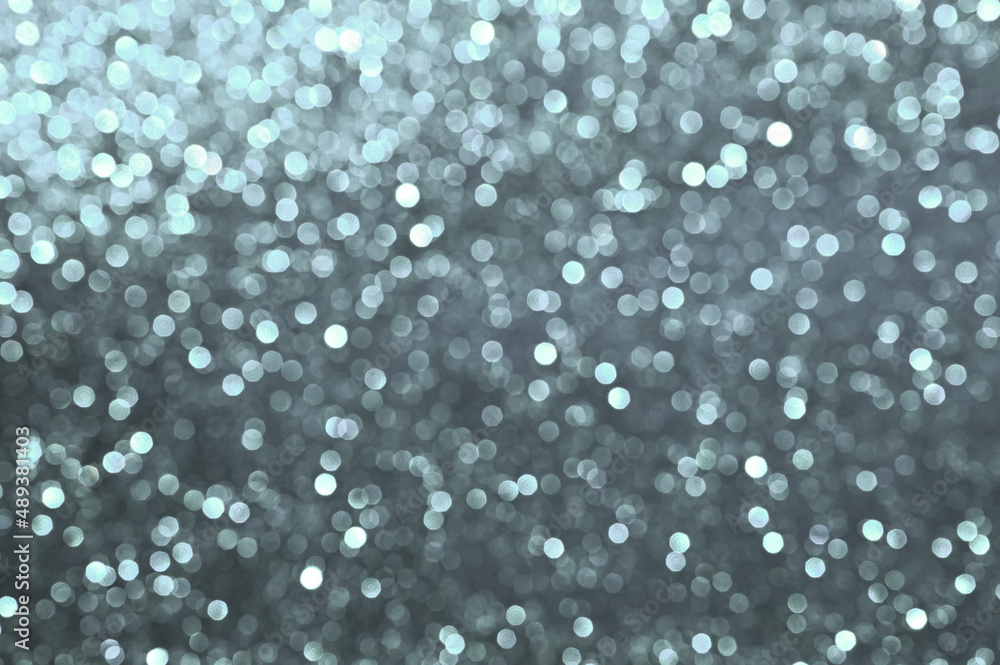 Trendy silver grey blurred and sparkling background Trendy silver grey blurred and sparkling background