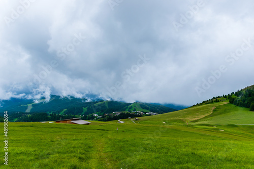 A picturesque landscape view of the French Alps mountains on a cloudy summer day (Valberg, Alpes-Maritimes, France)