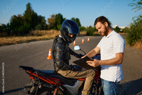 Male student and instructor, motorcycle school photo