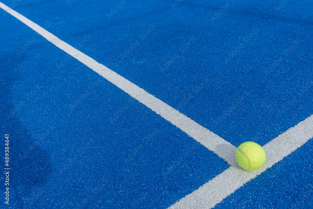 Paddle tennis ball on a paddle tennis court for background
