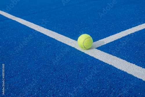 Paddle tennis ball on a paddle tennis court for background © Vic