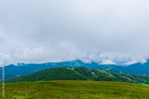 A picturesque landscape view of the French Alps mountains on a cloudy summer day (Valberg, Alpes-Maritimes, France)