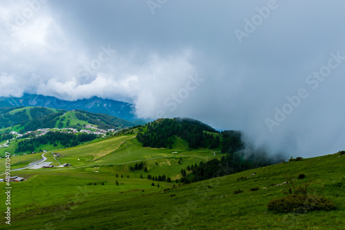 A picturesque landscape view of the French Alps mountains on a cloudy summer day (Valberg, Alpes-Maritimes, France)