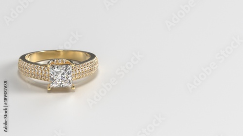 princess yellow gold engagement ring with side three layer stones on shank laying down front