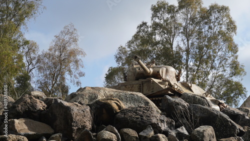 Israeli M51 Sherman tank with 105 mm gun on display in the 7th brigade tank monument, Israel.  Upgraded M4A1 with improved engine used by the Israel Defense Forces. photo