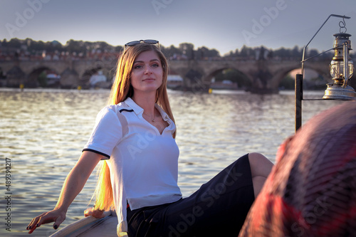 portrait of a girl in a golden hour on Vltava River