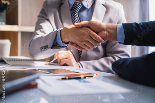 Fototapeta Handshake as successful negotiation ending, Business partnership meeting concept