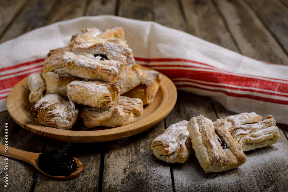 Salcici fatty homemade cookies on old wooden table Salcici fatty homemade cookies on old wooden table