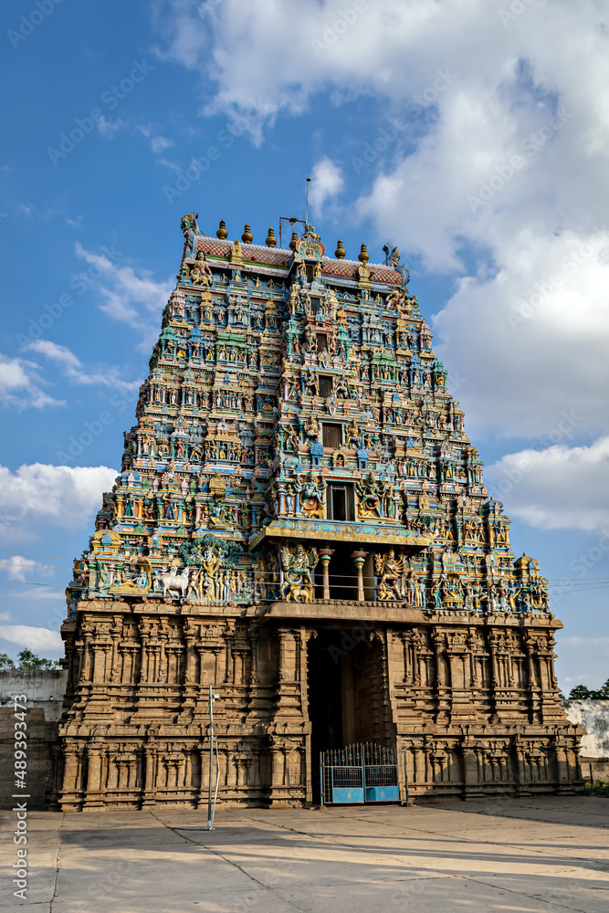 Intricately carved, colorful Gopuram of ancient Algar Koil Vishnu Kallazhagar temple, Madurai.