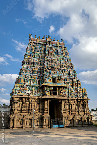 Intricately carved, colorful Gopuram of ancient Algar Koil Vishnu Kallazhagar temple, Madurai. photo