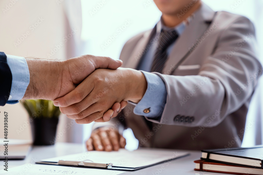 Handshake as successful negotiation ending, Business partnership meeting concept. Image businessmans handshake. Successful businessmen handshaking after good deal, Handshake as successful negotiation ending, Business partnership meeting concept. Image businessmans handshake. Successful businessmen handshaking after good deal,