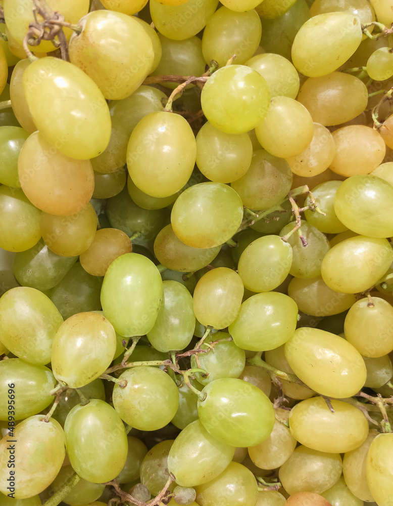 Fresh green grapes in market.Juicy grapes fruit background Fresh green grapes in market.Juicy grapes fruit background