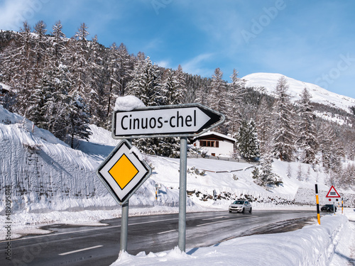 A local signpost of village Cinuos-Chel in Graubunden, Switzerland photo