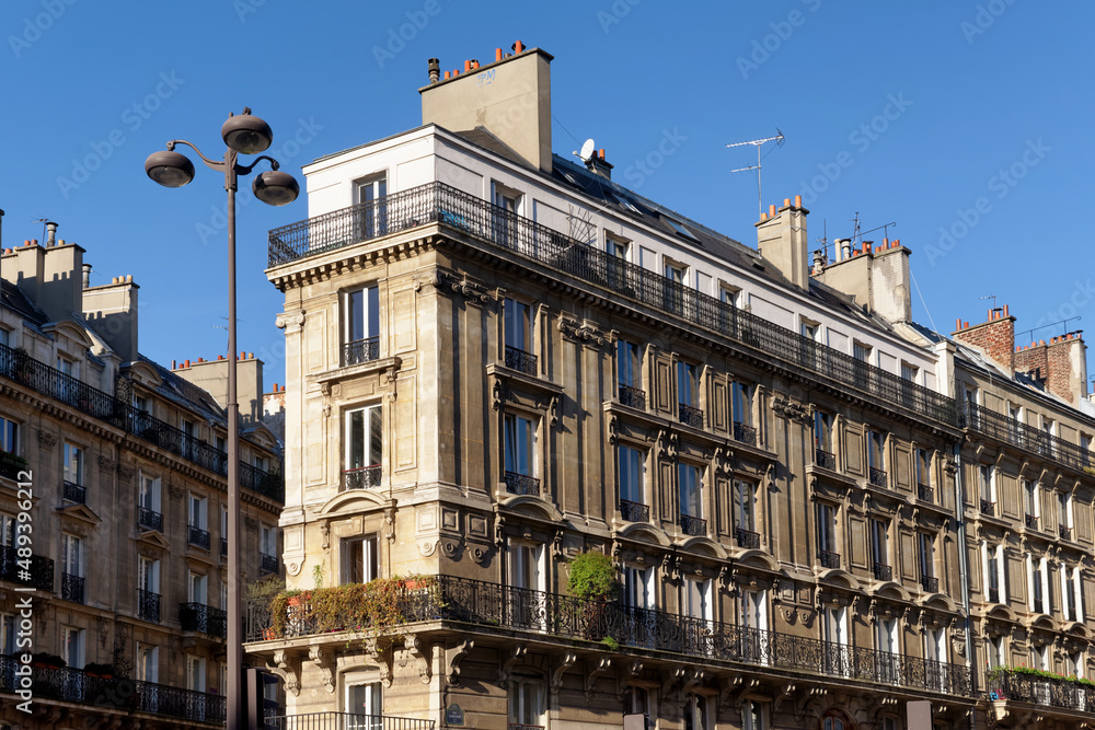 Corner building  in Moscow street. 8 th arrondissement of Paris city - obrazy, fototapety, plakaty 