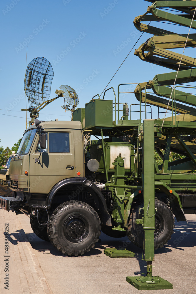 military radio communication vehicle in combat readiness with exposed means of communication and radar military radio communication vehicle in combat readiness with exposed means of communication and radar