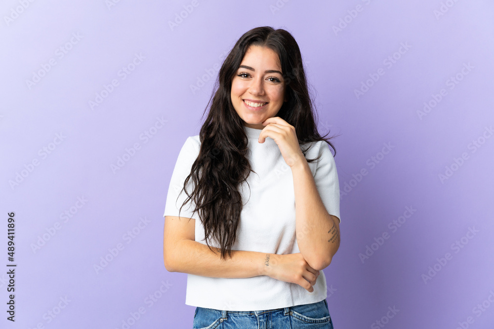 Young caucasian woman isolated on purple background laughing Young caucasian woman isolated on purple background laughing