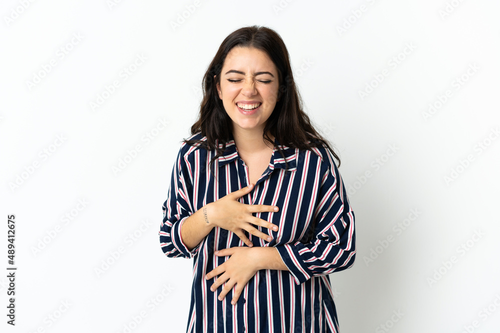Young caucasian woman over isolated background smiling a lot Young caucasian woman over isolated background smiling a lot