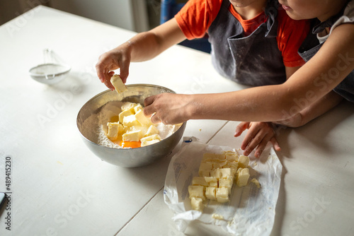 children hands with butter