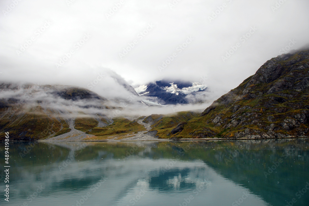 Mountain Peak, Fog, and Green Water in Glacier Bay National Park Mountain Peak, Fog, and Green Water in Glacier Bay National Park